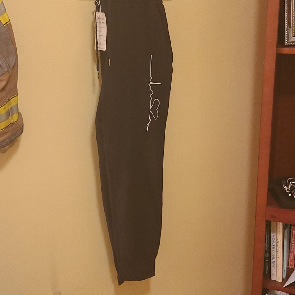 Jogging and pants with medical design on the side